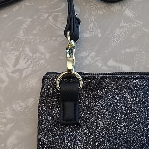 Betsey Johnson glimmering wristlet. - Picture 6 of 12